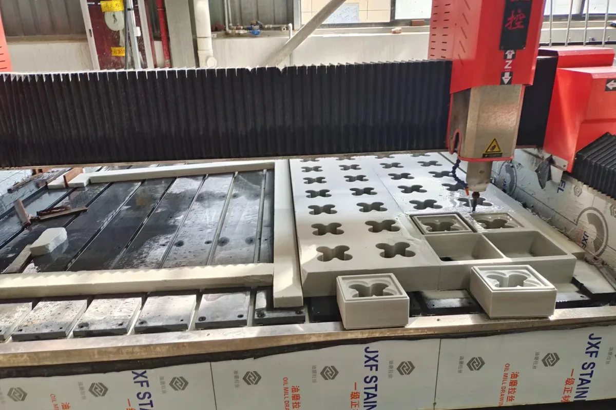 CNC equipment cutting foamed ceramic panels